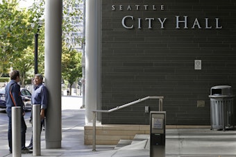 caption: An entrance to Seattle City Hall is shown, Tuesday, Sept. 12, 2017, in downtown Seattle. 