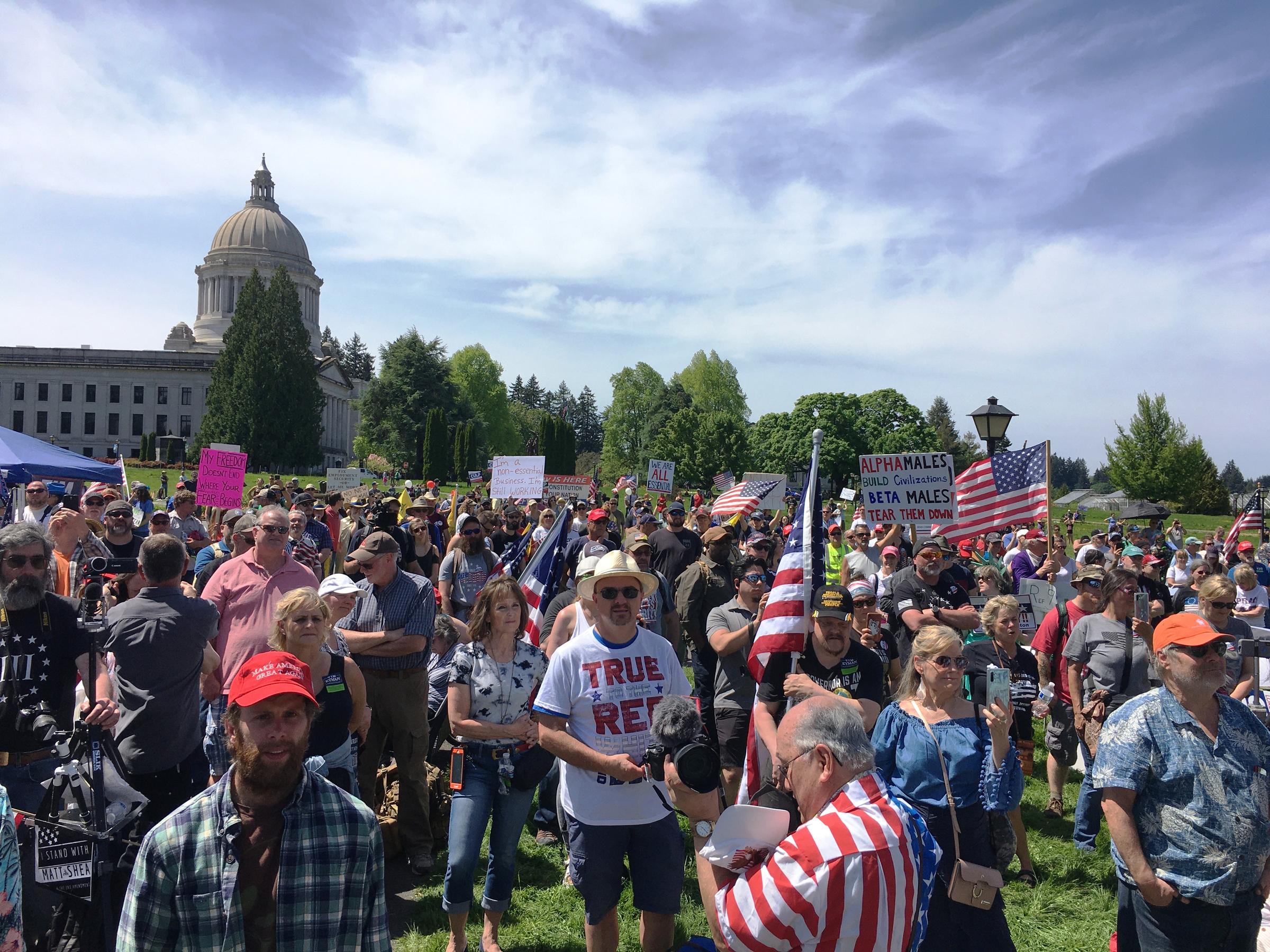 caption: The Washington State Patrol estimated 1,500 people attended an unpermitted "Hazardous Liberty" rally a the Washington state Capitol on Saturday. The rally, like a similar event in April, was held in defiance of Gov. Jay Inslee's ban on large gatherings.