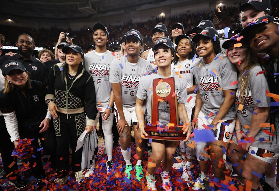 caption: The South Carolina Gamecocks celebrate after their Monday night win over Maryland.