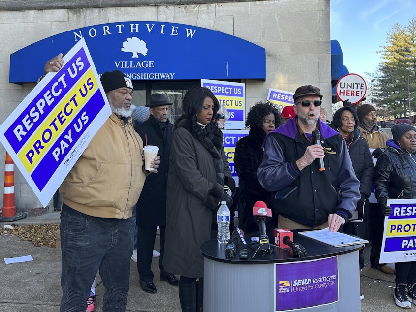 caption: Supporters of Northview Village Nursing Home gather in St. Louis on Tuesday to show support for displaced residents and the employees left jobless by the facility's sudden closure.