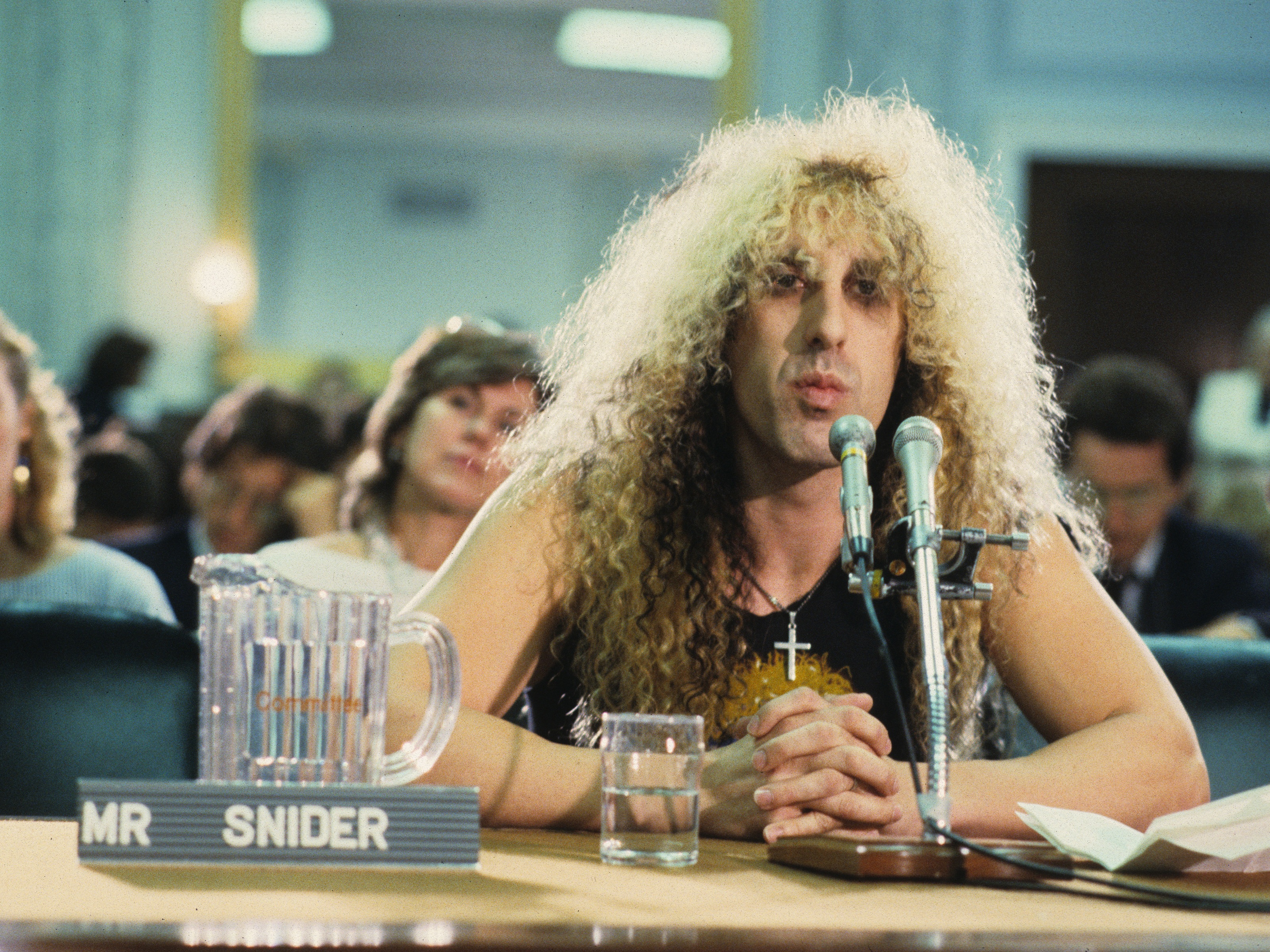 caption: Dee Snider of American metal band Twisted Sister appears at the PMRC senate hearing on Capitol Hill on Sept. 19, 1985. Representatives of the Parents Music Resource Center, senators and musicians testified before the Senate Commerce, Science and Transportation Committee on "the subject of the content of certain sound recordings and suggestions that recording packages be labeled to provide a warning to prospective purchasers of sexually explicit or other potentially offensive content."