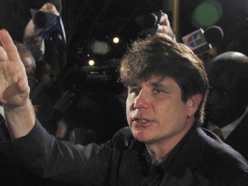caption: Former Illinois Gov. Rod Blagojevich departs his Chicago home in 2012. On Tuesday, Trump commuted the 14-year sentence of Blagojevich, who has been serving a prison term after being convicted of corruption charges.