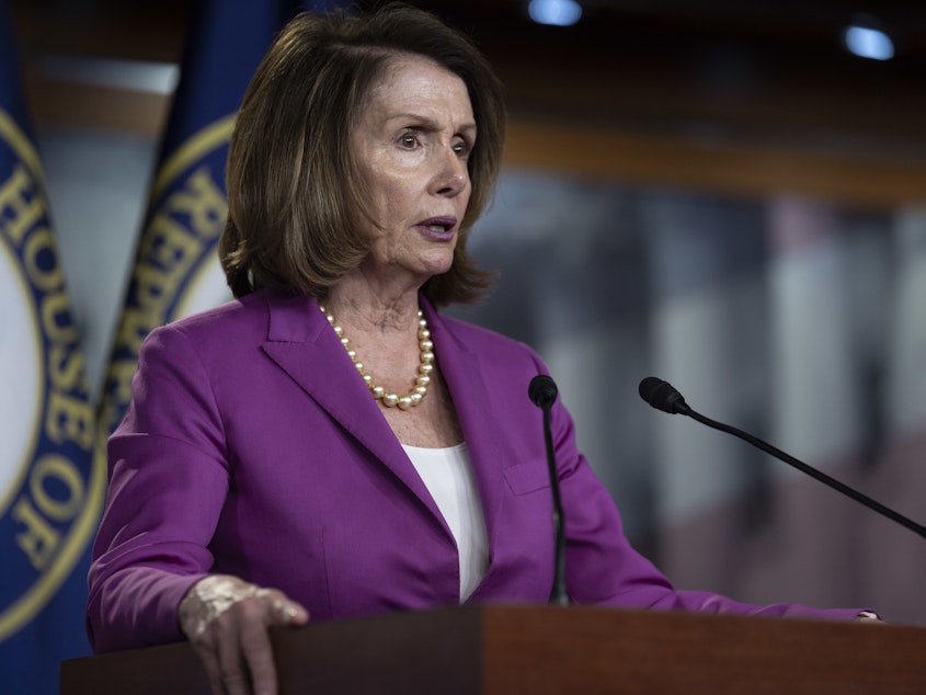 caption: Democratic House Minority Leader Nancy Pelosi of California delivers remarks during her weekly press conference at the Capitol on June 21.