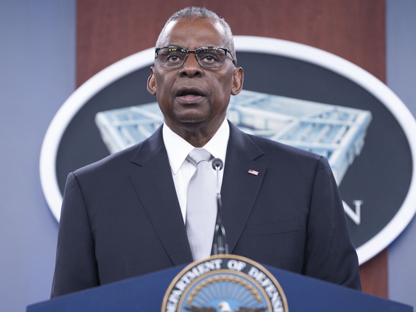 caption: Defense Secretary Lloyd Austin speaks during a Pentagon press briefing at the Pentagon on Feb. 1 in Washington.