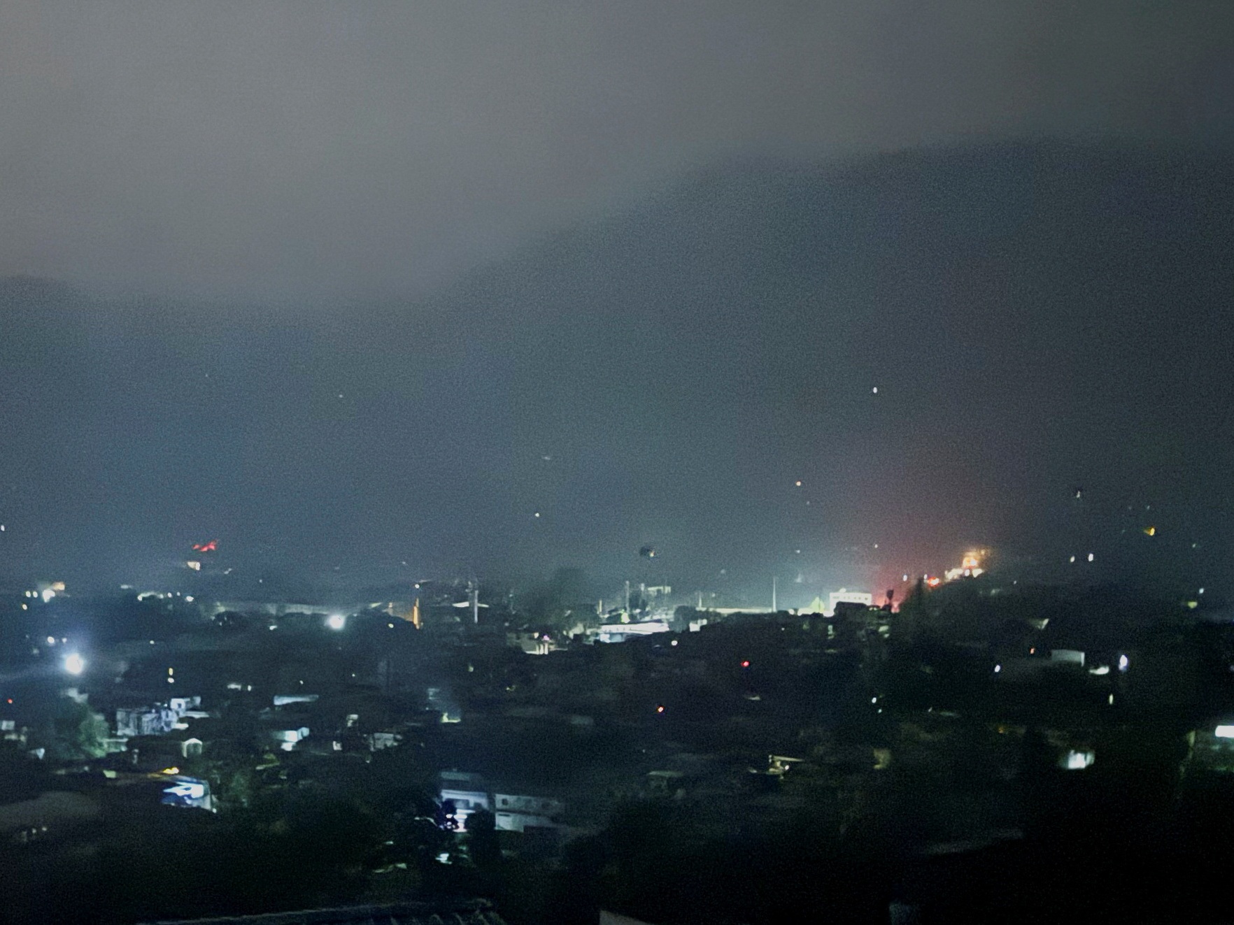 caption: A city view of Muzaffarabad in Pakistan-administrated Kashmir, Wednesday.