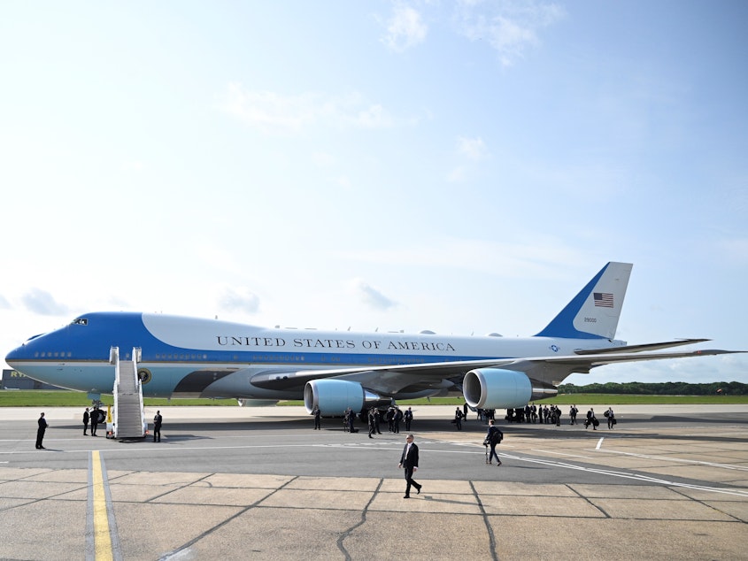 caption: Air Force One following the arrival of U.S. President Donald Trump at Stansted Airport on June 3, 2019 in London, England.