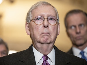 caption: Senate Minority Leader Mitch McConnell (R-KY) speaks to reporters on March 10, 2020. On Wednesday, he was re-elected to lead Senate Republicans.
