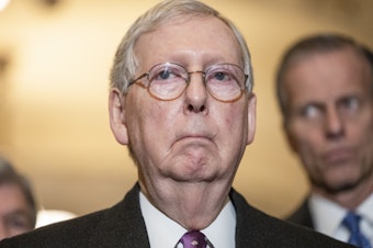 caption: Senate Minority Leader Mitch McConnell (R-KY) speaks to reporters on March 10, 2020. On Wednesday, he was re-elected to lead Senate Republicans.