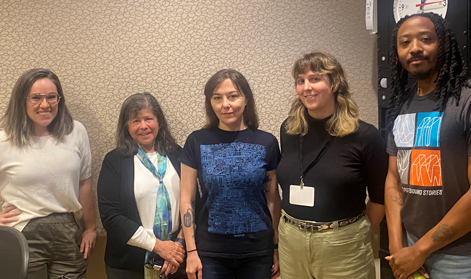 caption: Guest hosts Mike Davis and Libby Denkmann discuss the week’s news with freelance health journalist Joanne Silberner, PubliCola’s Erica Barnett, and The Stranger’s Vivian McCall.