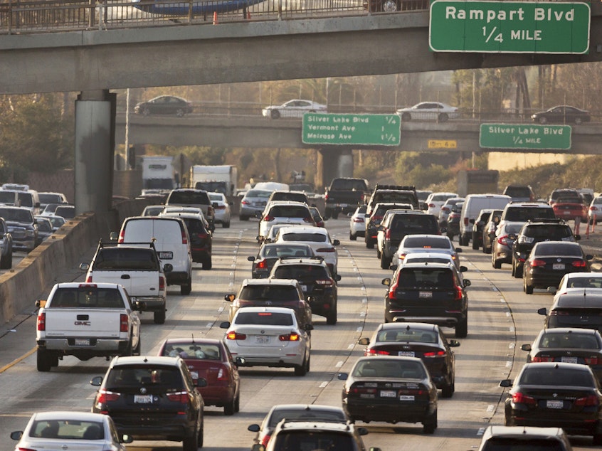 caption: Traffic on the Hollywood Freeway in Los Angeles in 2018. The Trump administration is weakening auto pollution standards, rolling back a key Obama-era policy that sought to curb climate change.