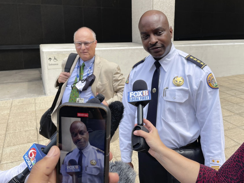 caption: New Orleans Police Superintendent Shaun Ferguson talks to reporters outside the federal courthouse in New Orleans on Aug. 17, 2022. Hoping to beef up a dwindling police force amid a rise in violent crime, New Orleans officials announced a three-year $80 million plan Thursday, Sept. 8, 2022, offering raises for all officers, free health care and $30,000 in incentive payments for new hires.