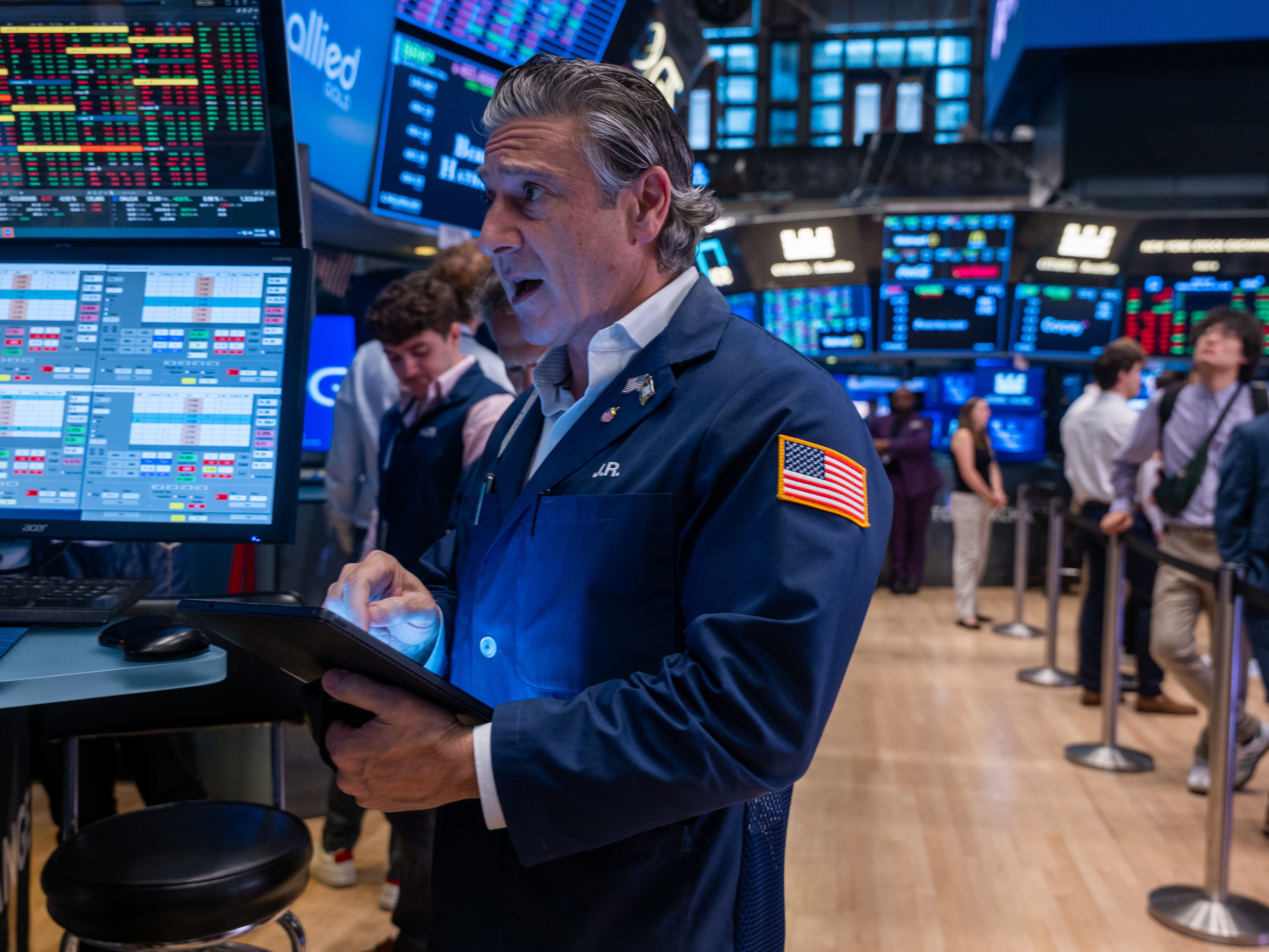 caption: The S&amp;P 500 index appeared headed for record territory Friday, rebounding from a spring slump tied to President Trump's trade war.