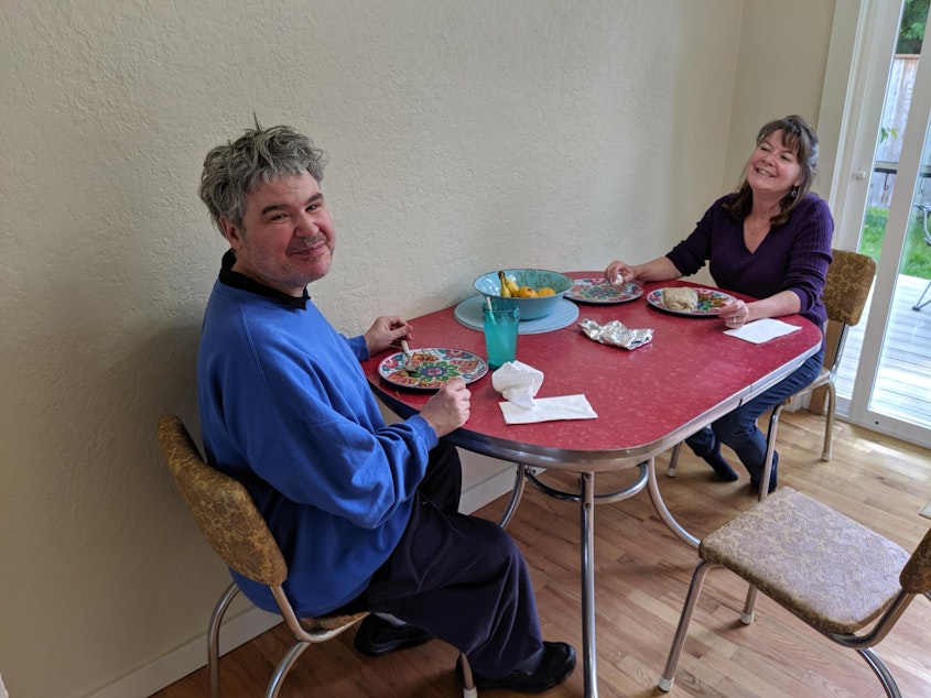 caption: Dawn Akerman and her brother Fred pose while having lunch together before he returned to the hospital in June.