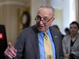 caption: Senate Majority Leader Chuck Schumer, D-N.Y., speaks to reporters following Democratic strategy session, at the Capitol in Washington on Wednesday.