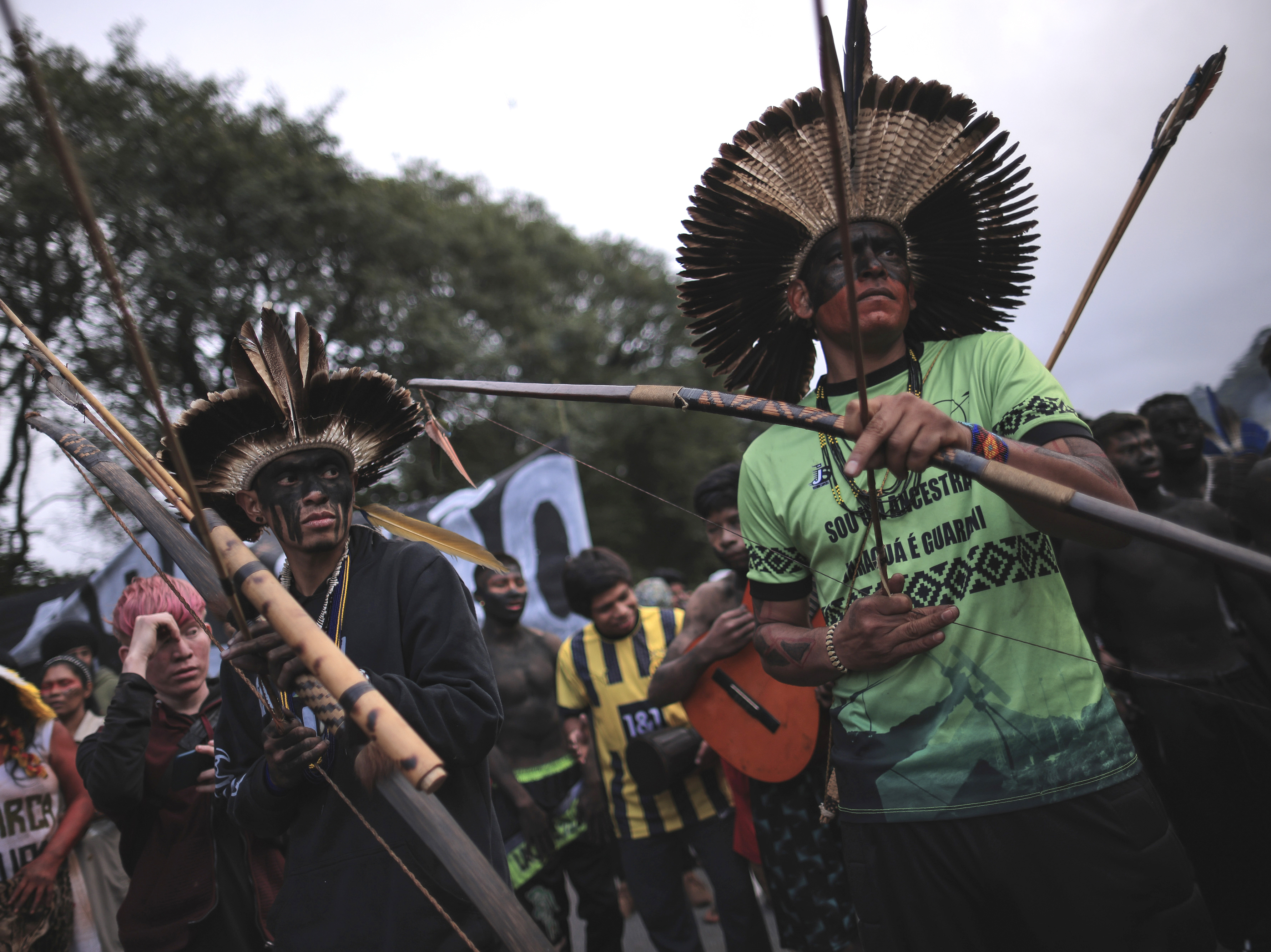 caption: Guarani Indigenous block Bandeirantes highway to protest proposed legislation that would change the policy that demarcates Indigenous lands on the outskirts of Sao Paulo.