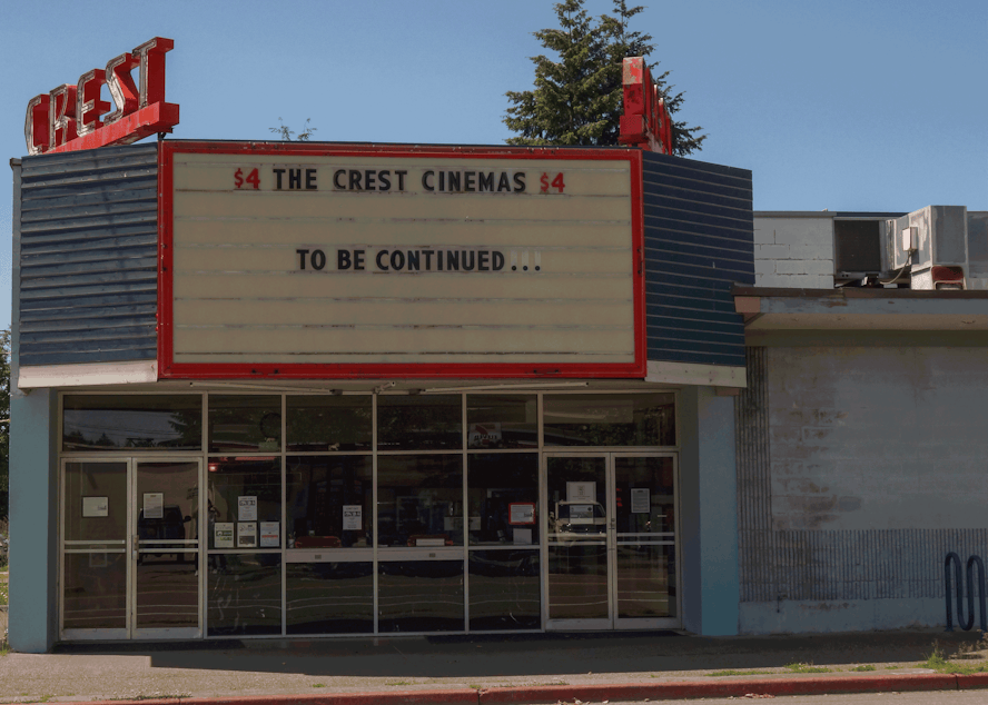 caption: Three movie theater marquees around the Seattle area announce their closure.