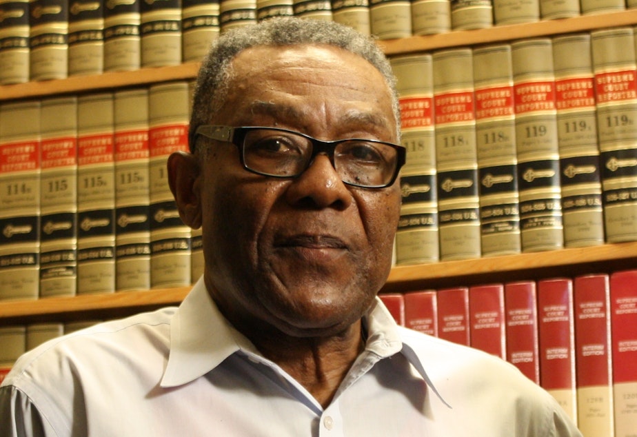 caption: Since his arrest last year, William Wingate, a 70-year-old veteran and retired bus driver, no longer stands up for the Seattle Police Department in conversations with his siblings.