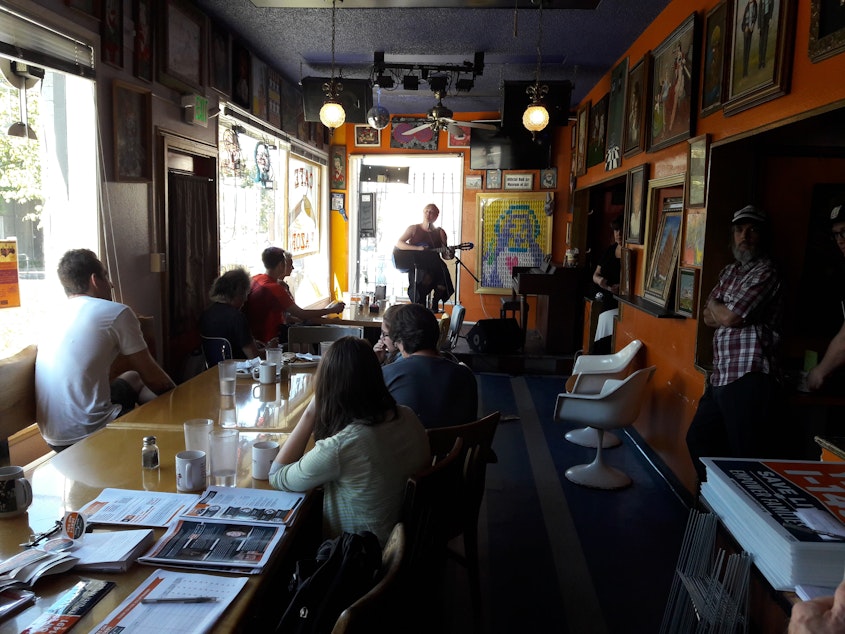 caption: Cafe Racer hosted one of dozens of concerts across the country Sunday.