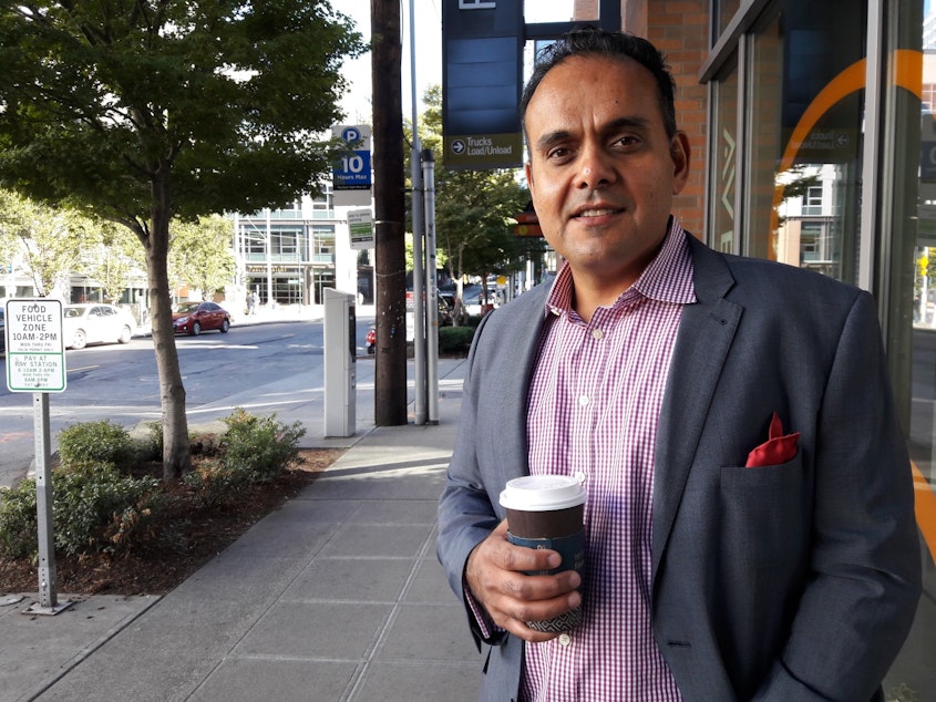 caption: Sunjay Pandey, a former Amazon product manager, now runs Capital One's innovation lab, practically on the doorstep of Amazon's South Lake Union headquarters.