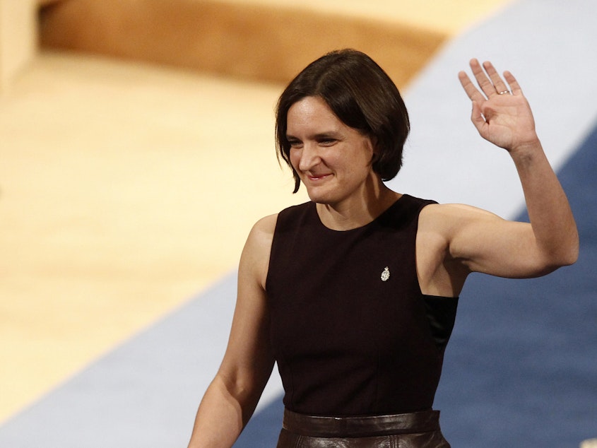 caption: Esther Duflo of France waves after receiving the Princess of Asturias award for Social Sciences from Spain's King Felipe VI at a ceremony in Oviedo, northern Spain. She is only the second woman to win the 2019 Nobel Prize in Economic Sciences, sharing it with Abhijit Banarjee and Michael Kremer.