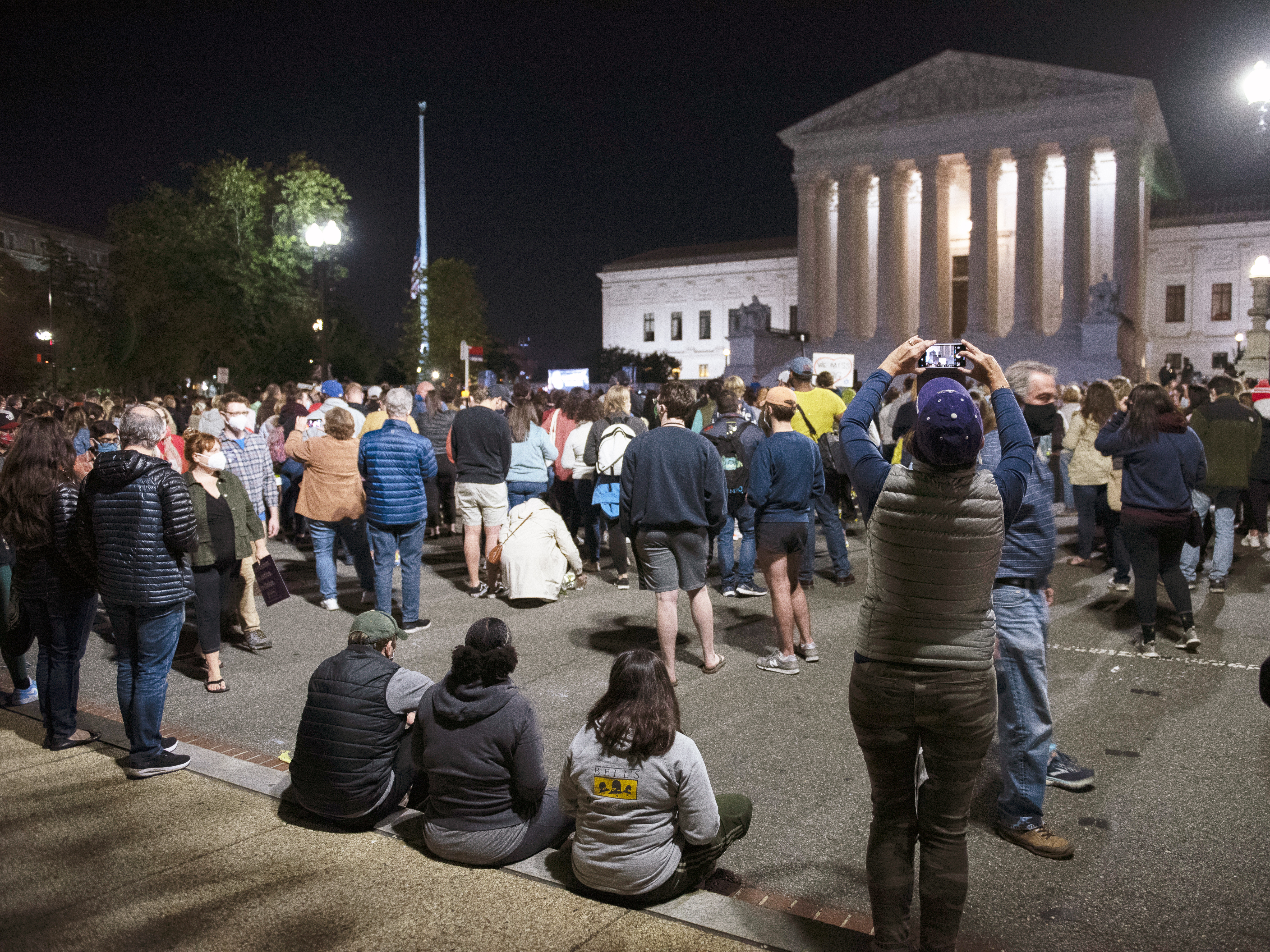 caption: Crowds gather Saturday at the Supreme Court to honor the late Justice Ruth Bader Ginsburg.