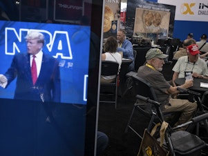 caption: Former President Donald Trump spoke at the NRA Annual Meetings & Exhibits in Houston, Texas on Friday.