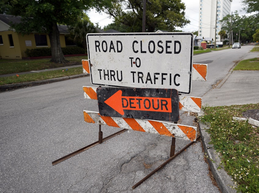 caption: A city street is closed for repairs and upgrades in Orlando, Fla. As part of an infrastructure proposal by the Biden administration, $115 billion is earmarked to modernize bridges, highways and roads.