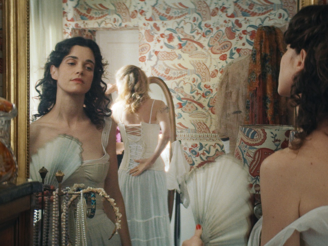 caption: Camille Rutherford stars as a would-be romance writer who works at a Paris bookstore in <em>Jane Austen Wrecked My Life.</em>