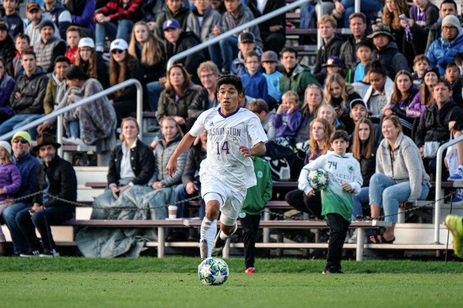 caption: Christian Soto from Des Moines, WA plays for the University of Washington men's soccer team