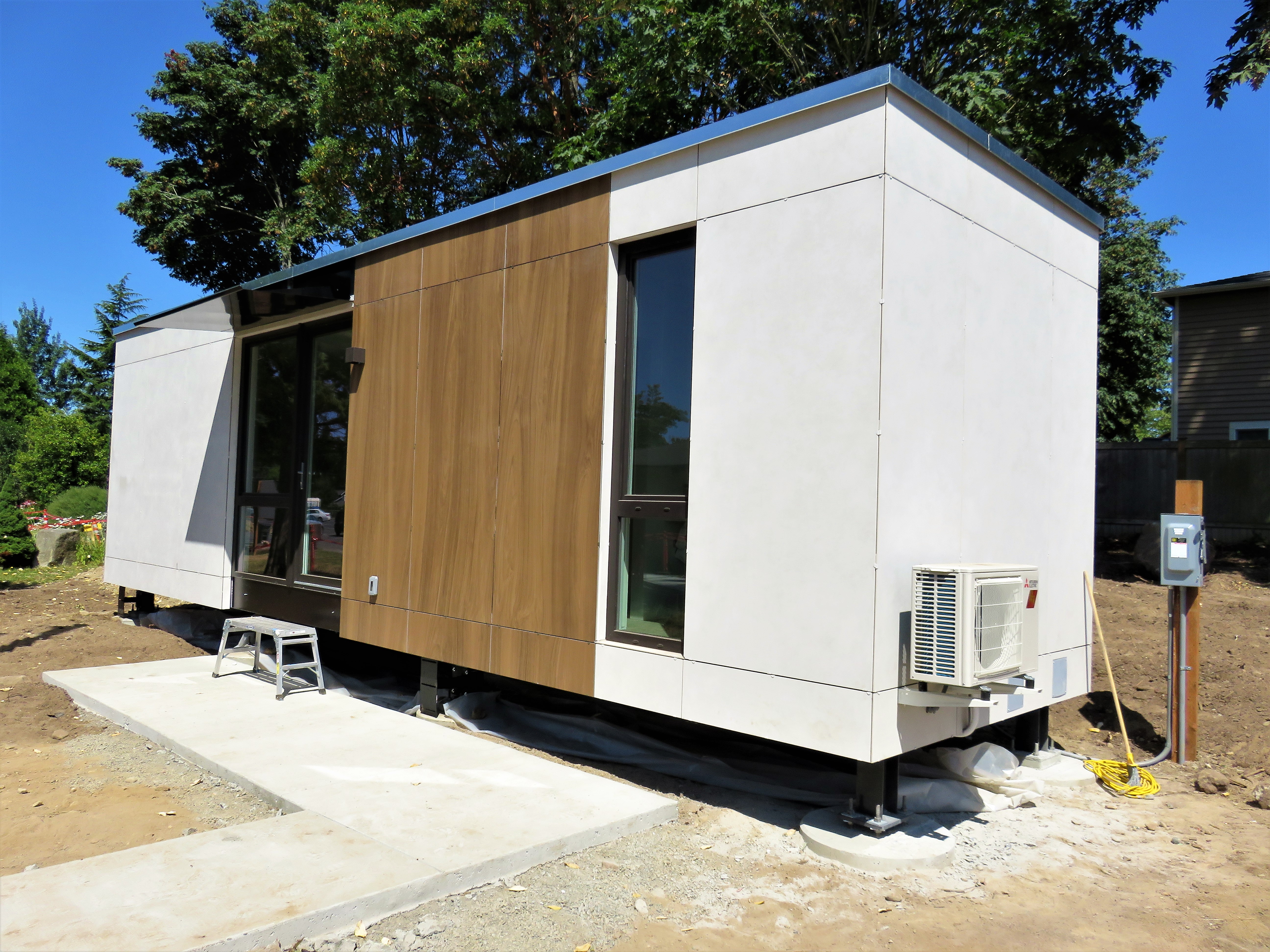 caption: This block home can house up to two people and will be ready by August.