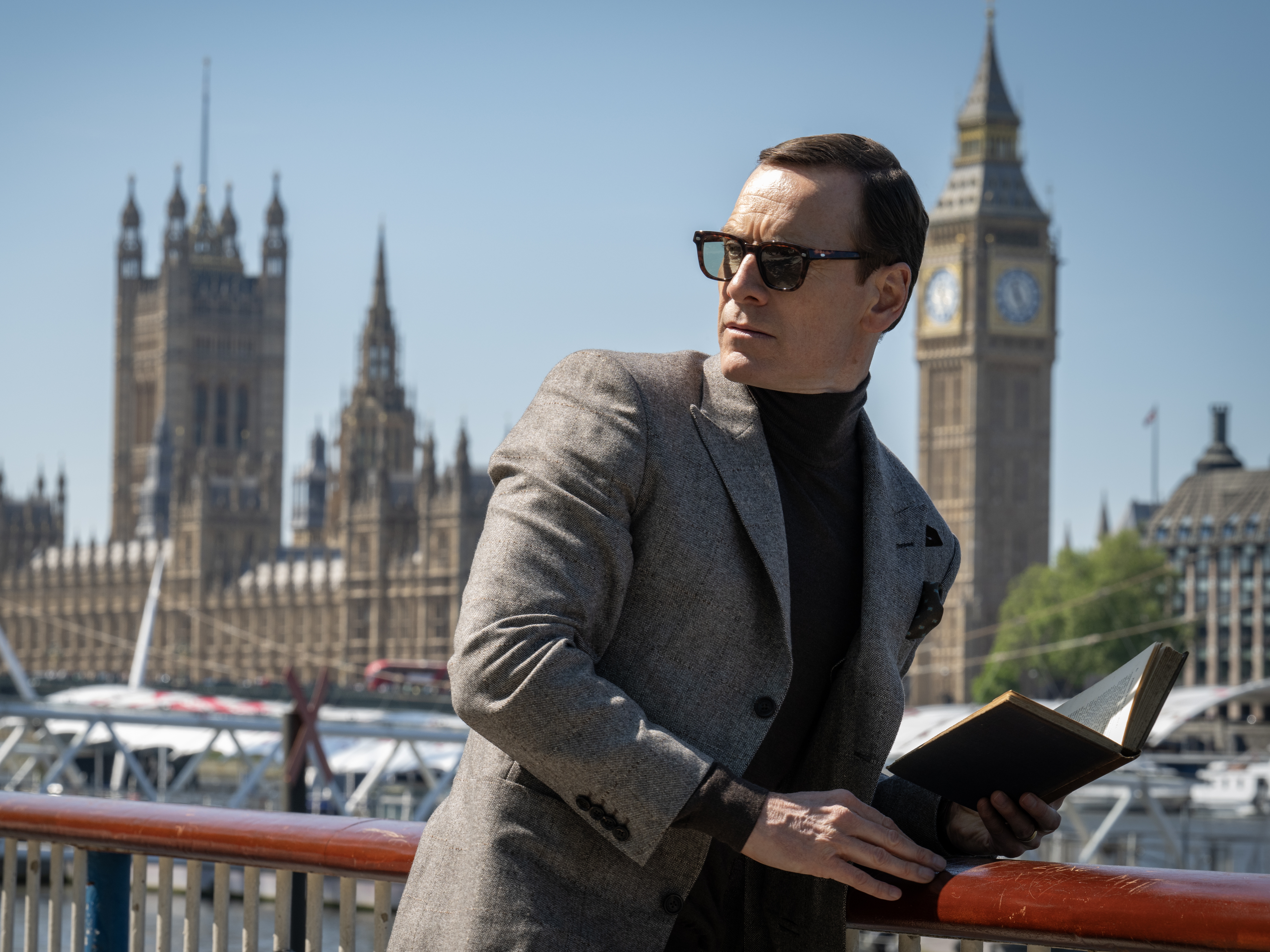 caption: Michael Fassbender stars as George in <em>Black Bag.</em>