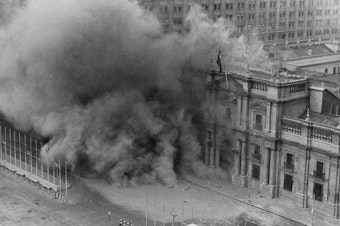 caption: Military jets bombed La Moneda presidential palace during the coup on Sept. 11, 1973, in Santiago, Chile. President Salvador Allende killed himself and Gen. Augusto Pinochet began a 17-year dictatorship.