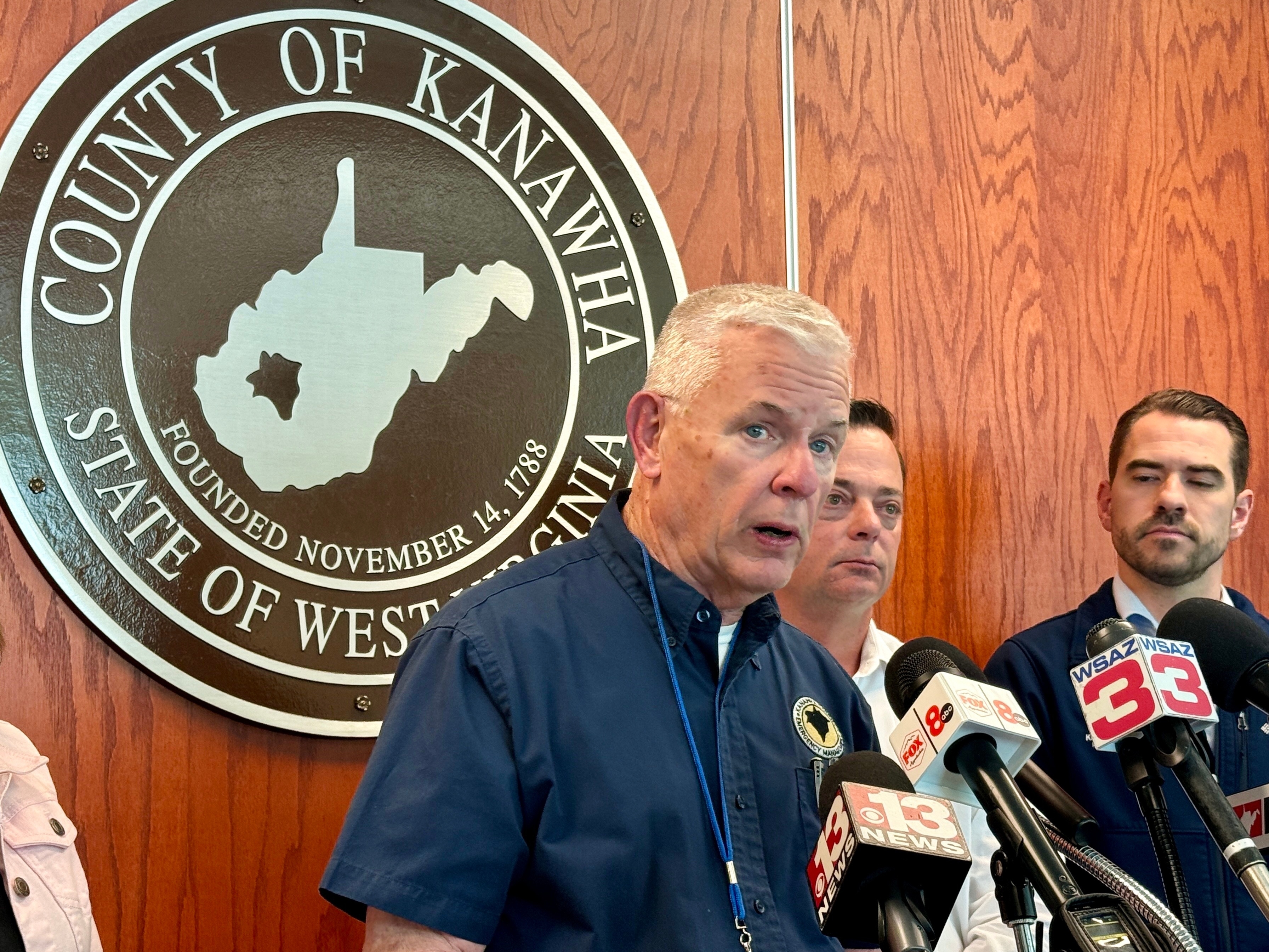 caption: Kanawha County Commission Emergency Management Director C.W. Sigman speaks at a news conference Wednesday in Charleston, W.Va.