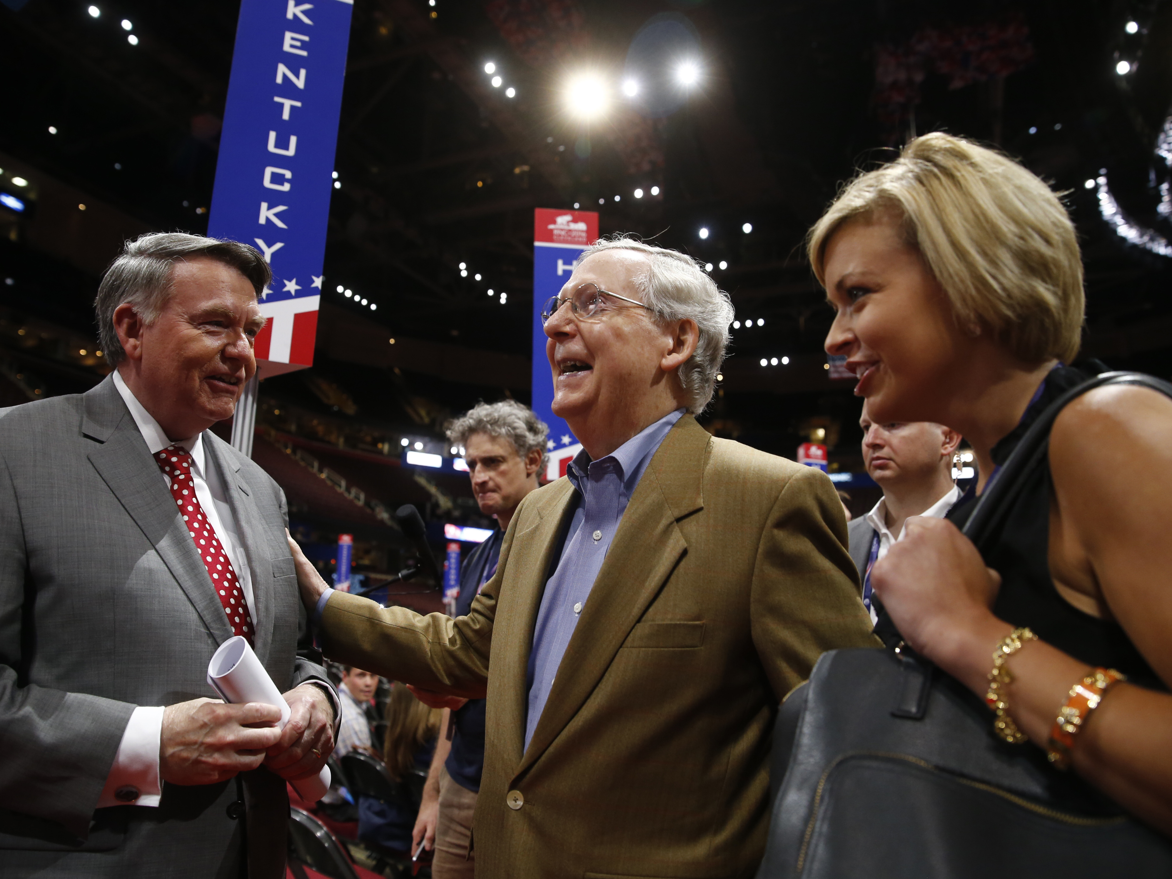 caption: Senate Majority Leader Mitch McConnell speaks with longtime ally Robert "Mike" Duncan, former chairman of the Republican National Committee and current chairman of the USPS Board of Governors, ahead of the 2016 Republican National Convention in Cleveland.