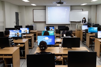 caption: North Korean defectors take a computer class inside Anseong Hanawon, Settlement Support Center for North Korean Refugees, in Anseong, South Korea, July 10.