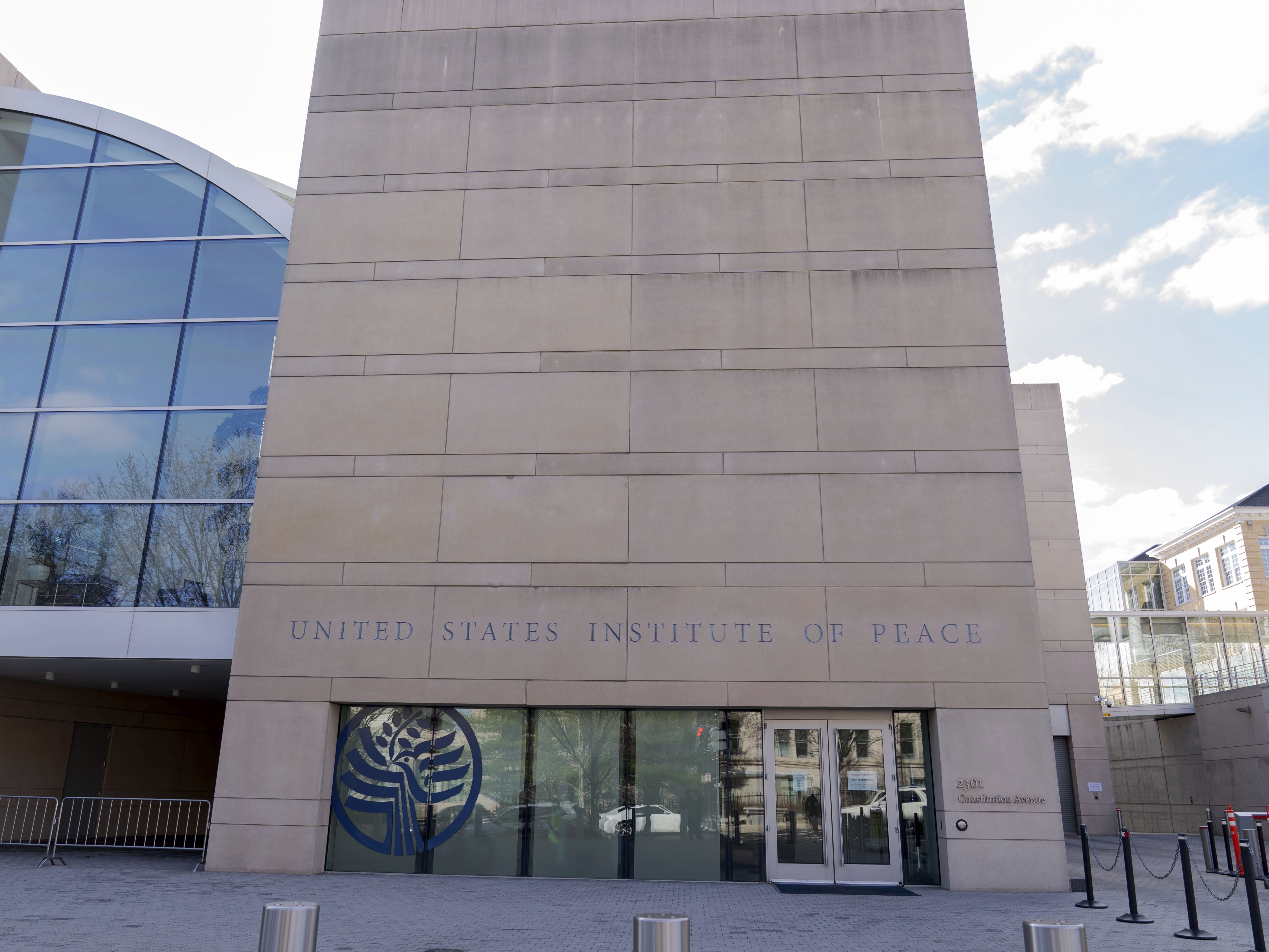 caption: The United State Institute of Peace building is seen, Monday, March 17, 2025, in Washington.