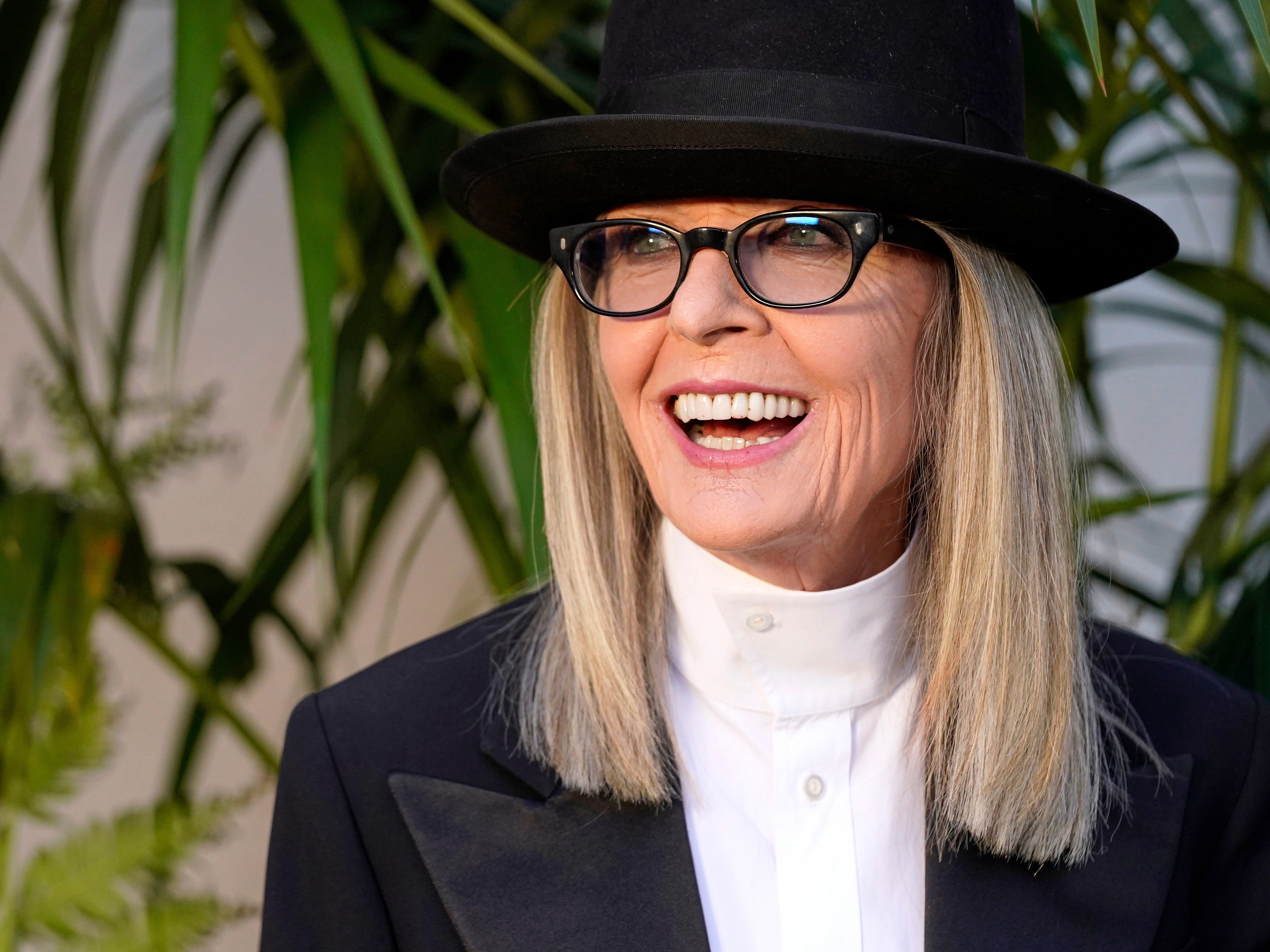 caption: Diane Keaton appears at the Ralph Lauren Spring 2023 Fashion Experience in Pasadena, Calif., on Oct. 13, 2022.