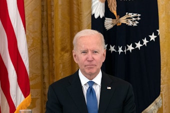 caption: President Biden has allowed a ban on certain kinds of foreign work visas to expire. Above, Biden holds his first cabinet meeting in the East Room of the White House on April 1, 2021.