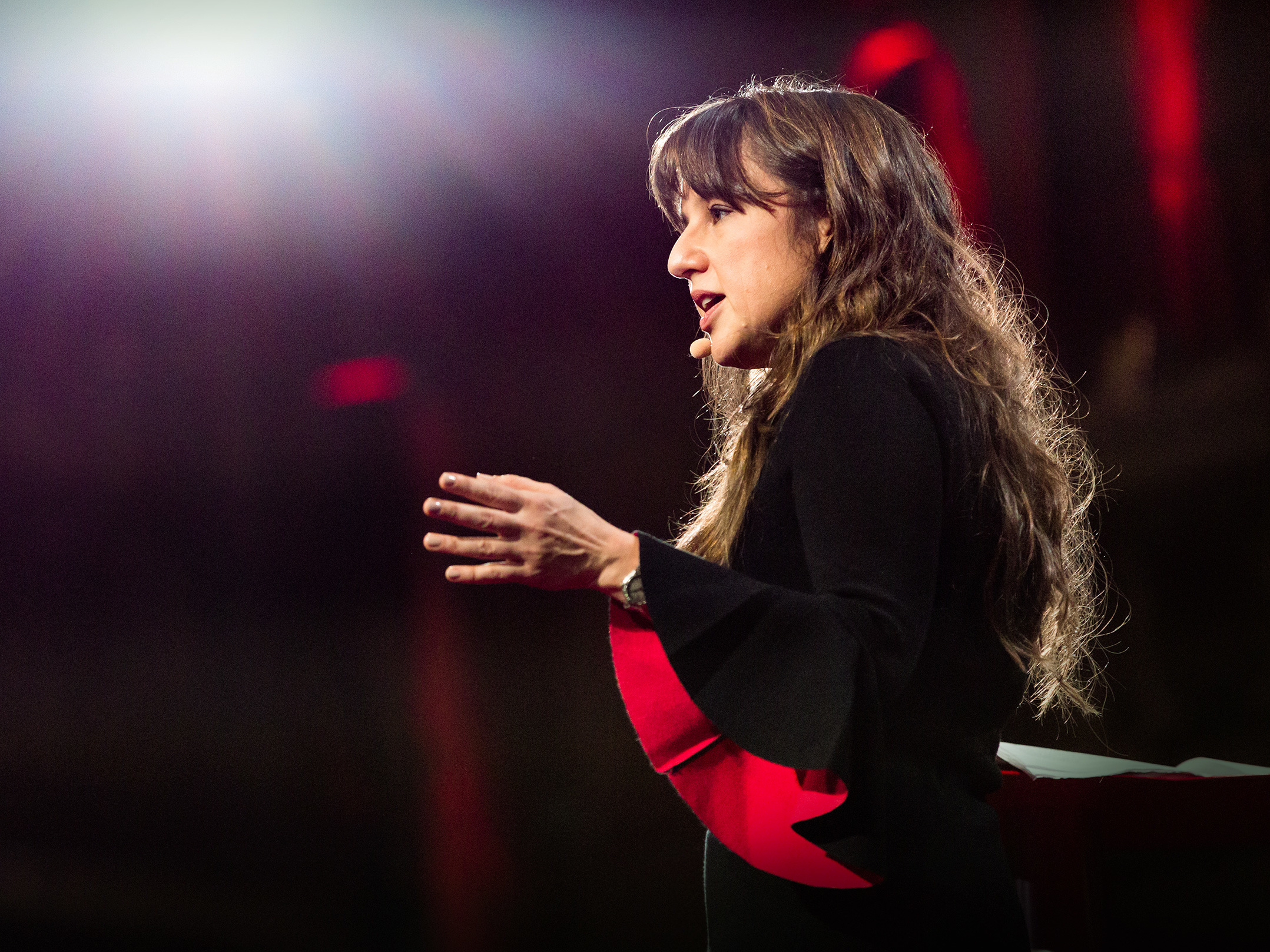 caption: Zeynep Tufekci on the TED stage.