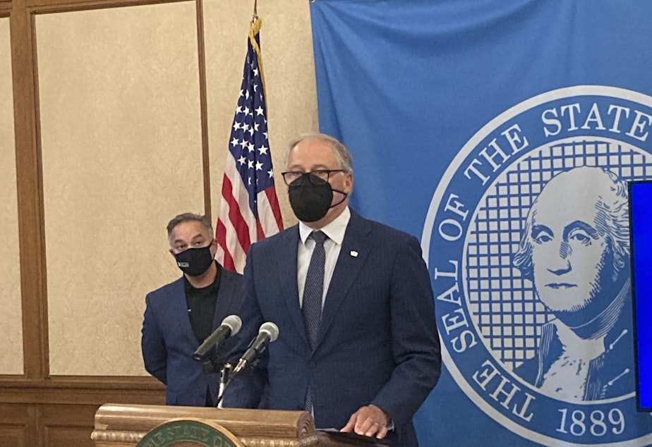 caption:  Wash. Gov. Jay Inslee holds a news conference on Thursday, October 14 and reiterated his call for state workers to comply with his vaccination mandate.