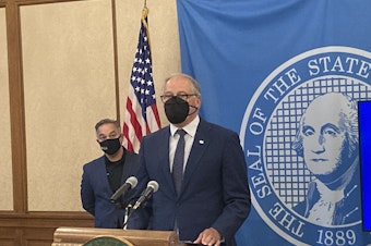 caption:  Wash. Gov. Jay Inslee holds a news conference on Thursday, October 14 and reiterated his call for state workers to comply with his vaccination mandate.