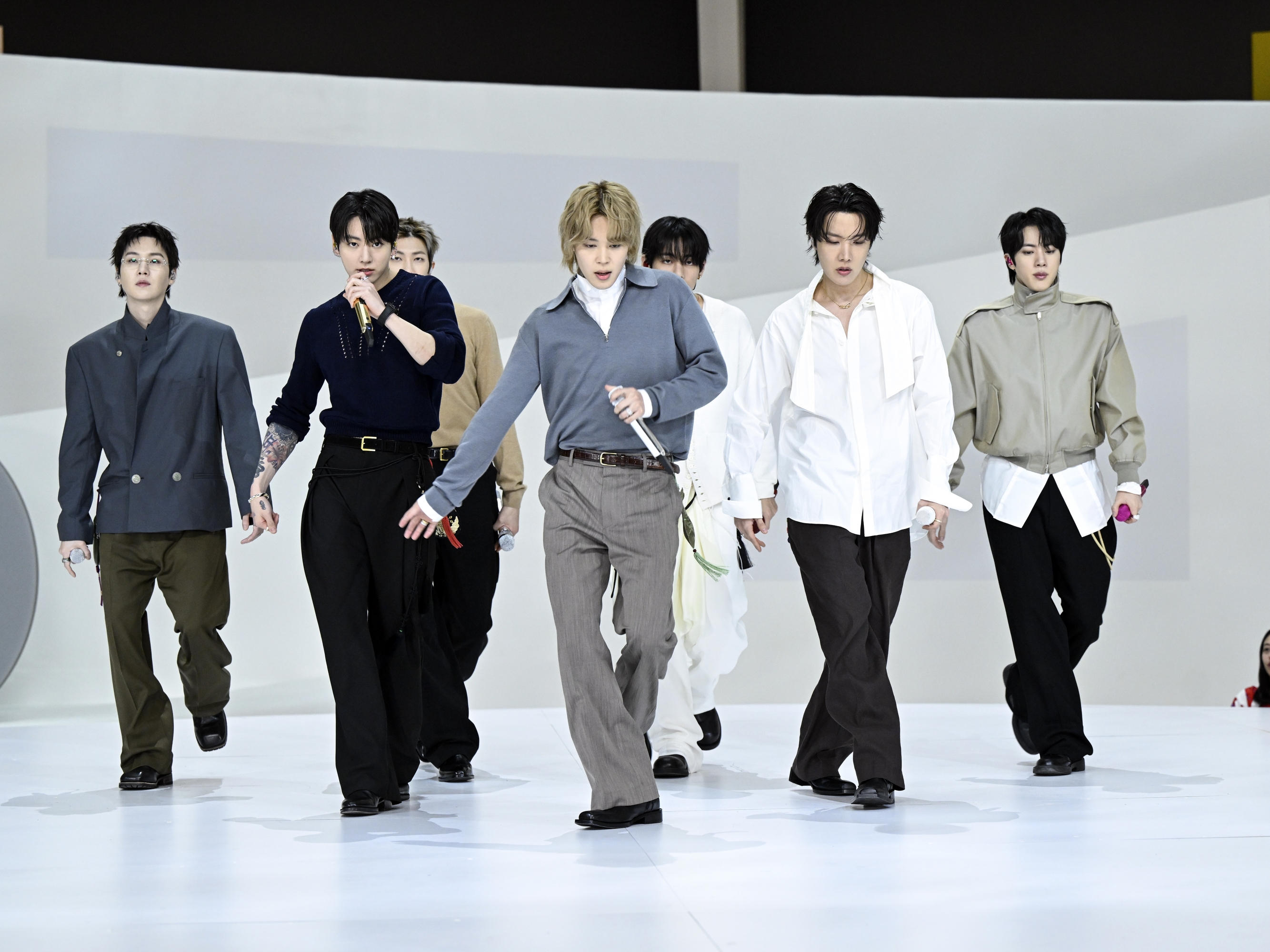 caption: BTS's album <em>Arirang</em> has now posted the longest run at No. 1 of any album in the boy band's career.