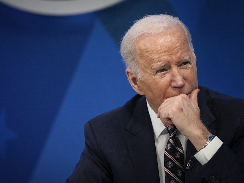 caption: President Biden participates in a meeting on Feb. 22. Biden's approval rating is up to 44%, which marks a third straight month of increases to Biden's approval rating.