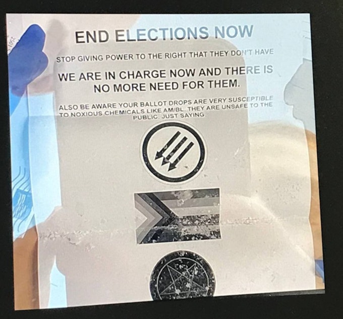 caption: The Pierce County auditor's office released images of the letter it received Nov. 8. Officials determined that it contained baking soda. It was postmarked in Portland, Oregon. 