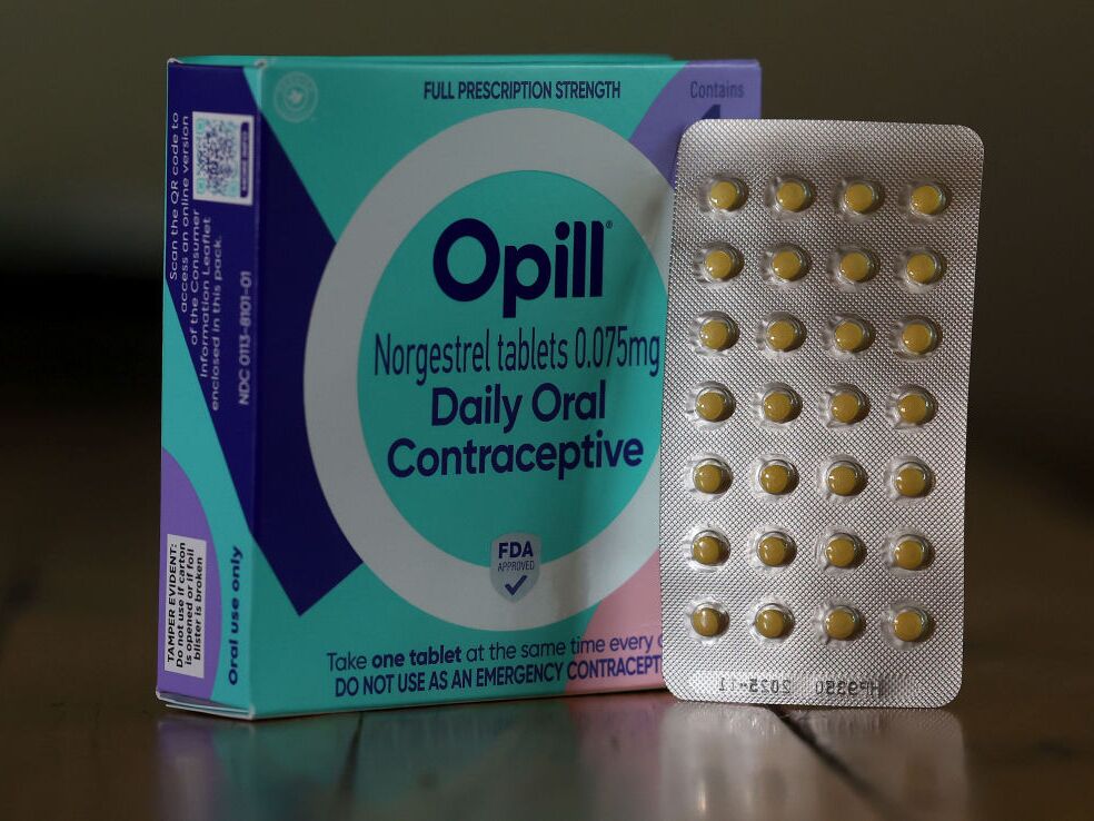 caption: In this photo illustration, a package of Opill is displayed on March 22.