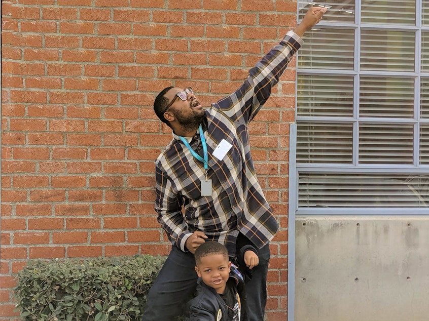 caption: Six-year-old Jerry Morrison and his uncle Joey Jefferson, a NASA engineer, talk about their mutual love for learning about space, in November 2019 at their StoryCorps interview in Los Angeles.