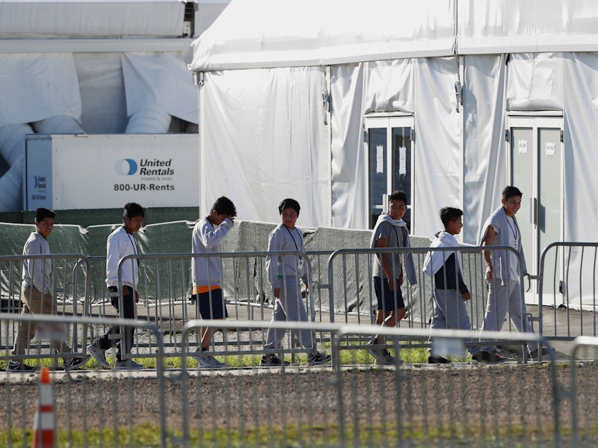 caption: The leader of a U.N. study on children's rights says of the U.S. policy of separating migrant children from their families, "I would call it inhuman treatment for both the parents and the children." Here, children are seen near a tent at the Homestead Temporary Shelter for Unaccompanied Children in Homestead, Fla., earlier this year.