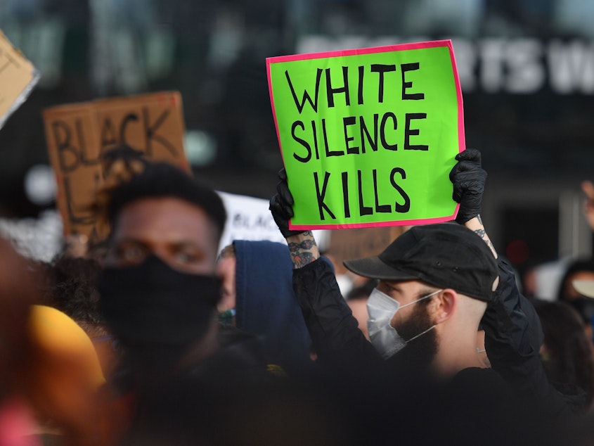 caption: <em>White Fragility </em>author Robin DiAngelo says the question white people should be asking themselves is not: Have I been shaped by race, but <em>how</em> have I been shaped by race? Above, protesters at a "Black Lives Matter" demonstration on June 1, 2020 in New York.