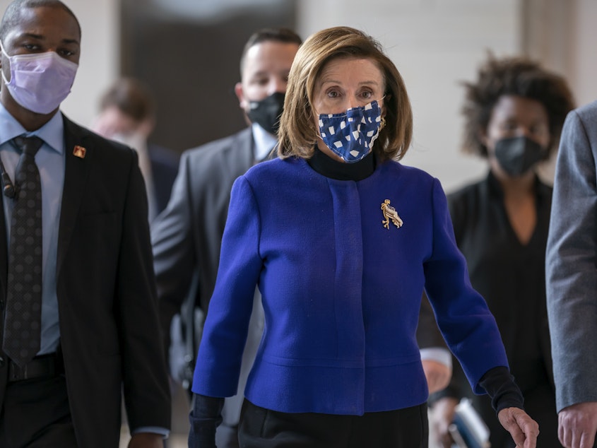 caption: House Speaker Nancy Pelosi, D-Calif., arrives at the Capitol Thursday to update reporters on the must-pass priority of funding the government.