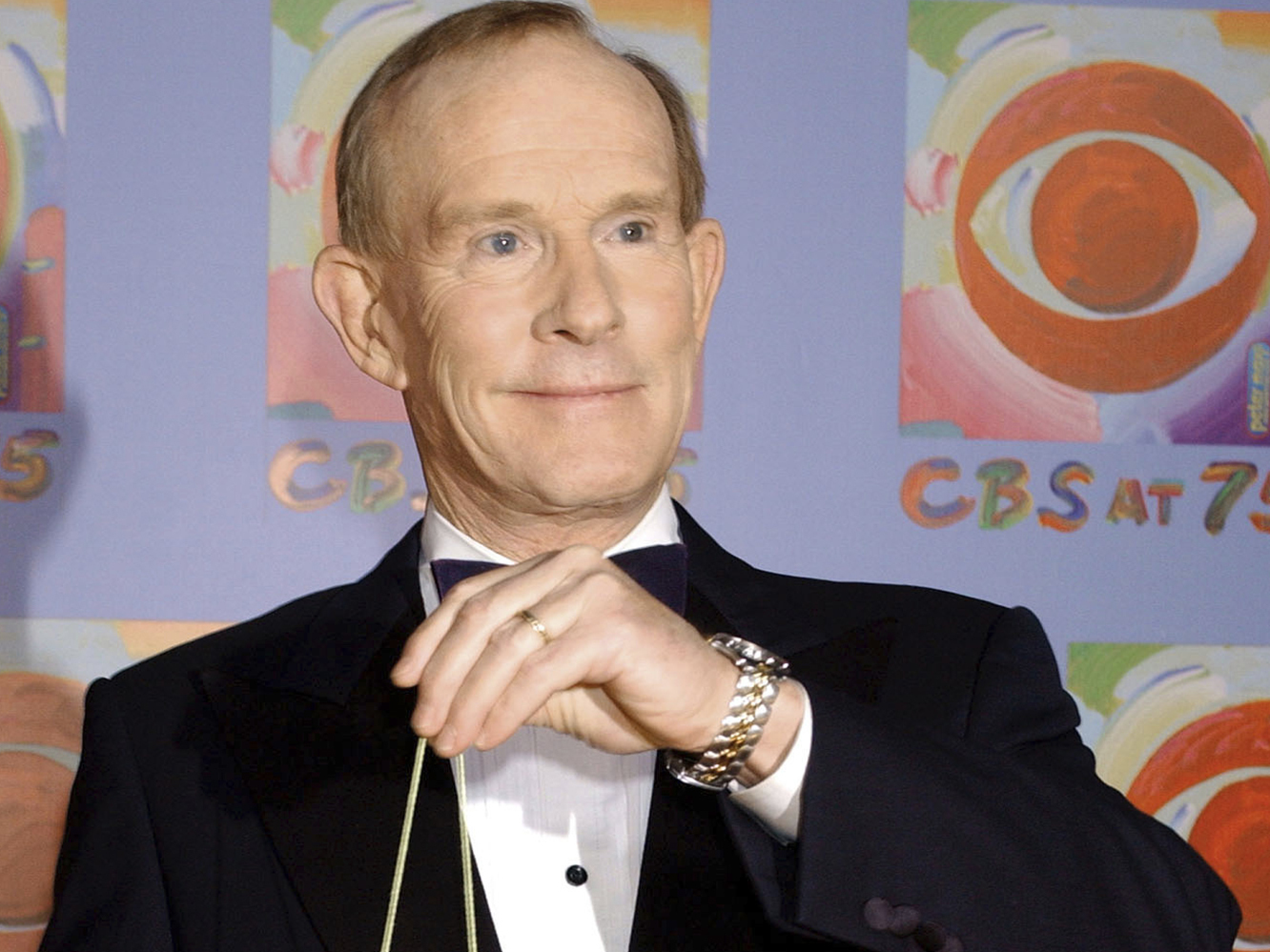 caption: Tom Smothers does yo-yo tricks during arrivals at CBS' 75th anniversary celebration on Nov. 2, 2003, in New York. Smothers, half of the Smothers Brothers and the co-host of one of the most socially conscious and groundbreaking television shows in the history of the medium, has died at age 86.
